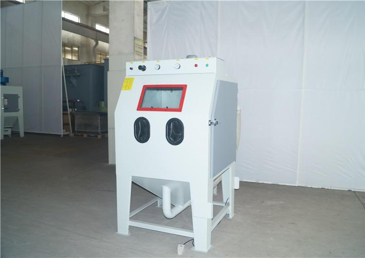 1678344952361602.jpg 6箱體式手動噴砂清理機(jī).jpg